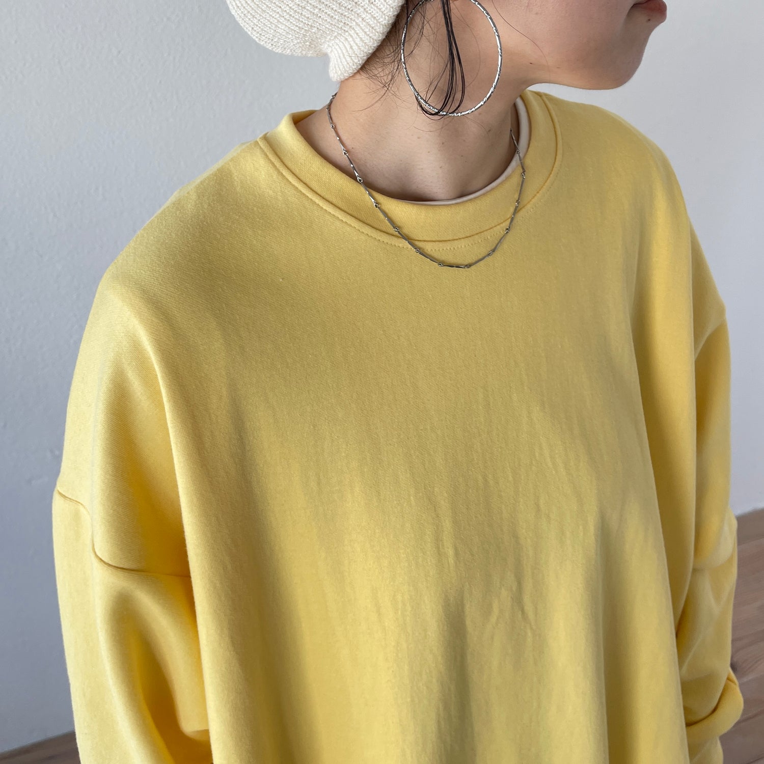 asymmetry design sweat / milky yellow
