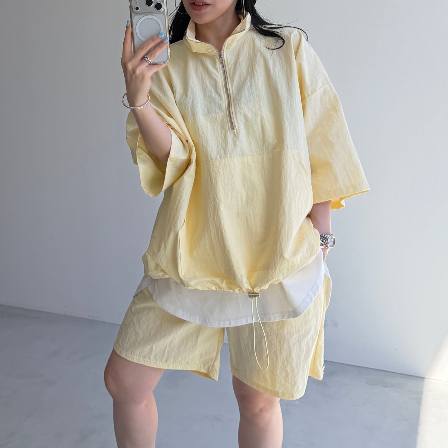 over size half zip nylon po / light yellow