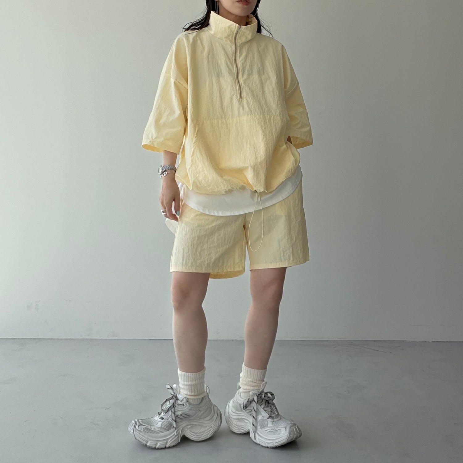 over size half zip nylon po / light yellow