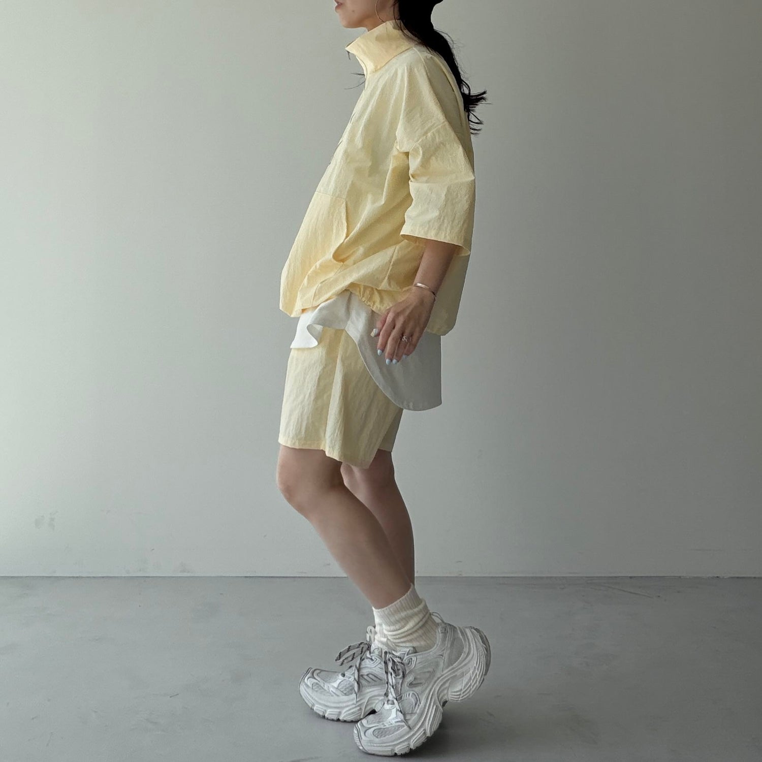 over size half zip nylon po / light yellow