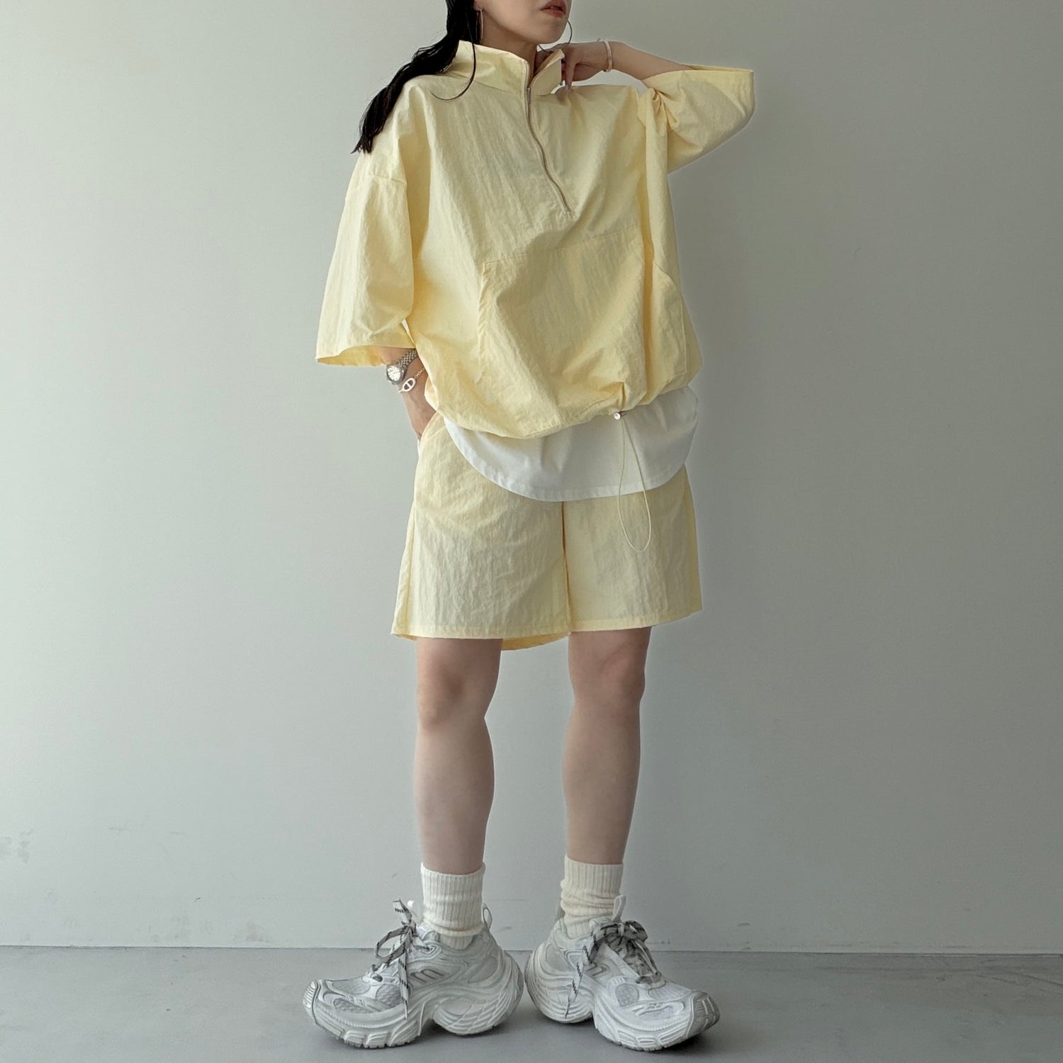 over size half zip nylon po / light yellow