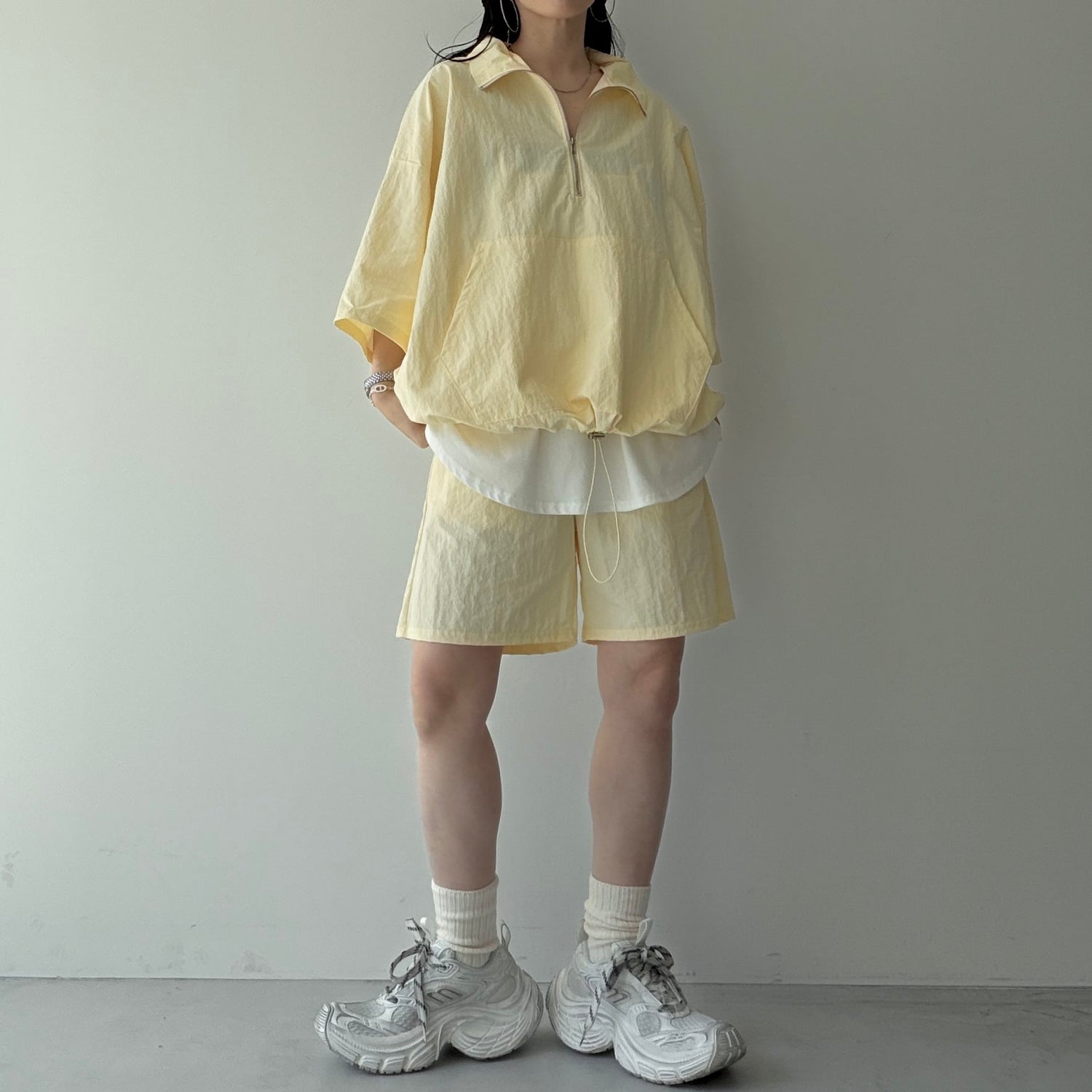 over size half zip nylon po / light yellow