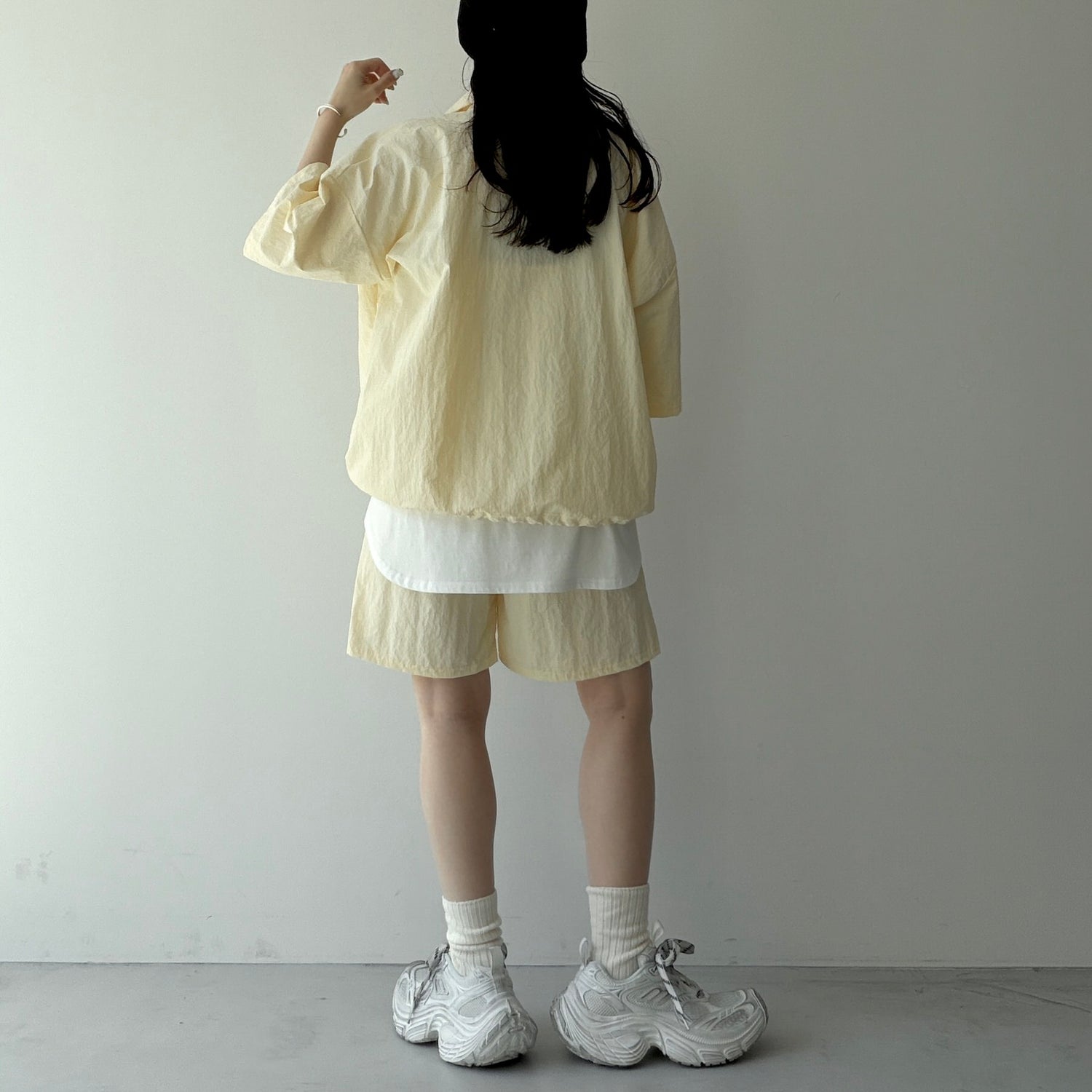 over size half zip nylon po / light yellow