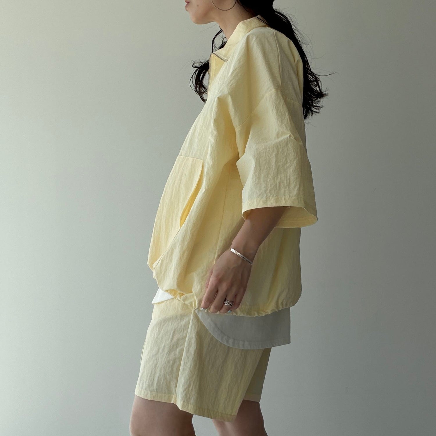 over size half zip nylon po / light yellow