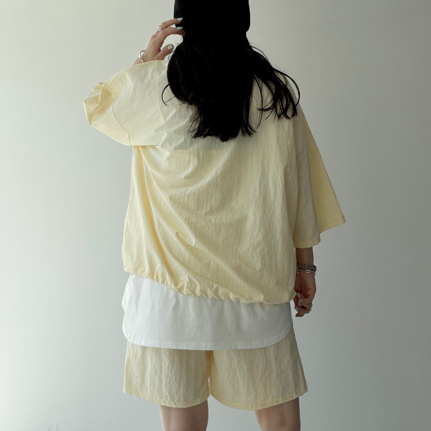 over size half zip nylon po / light yellow