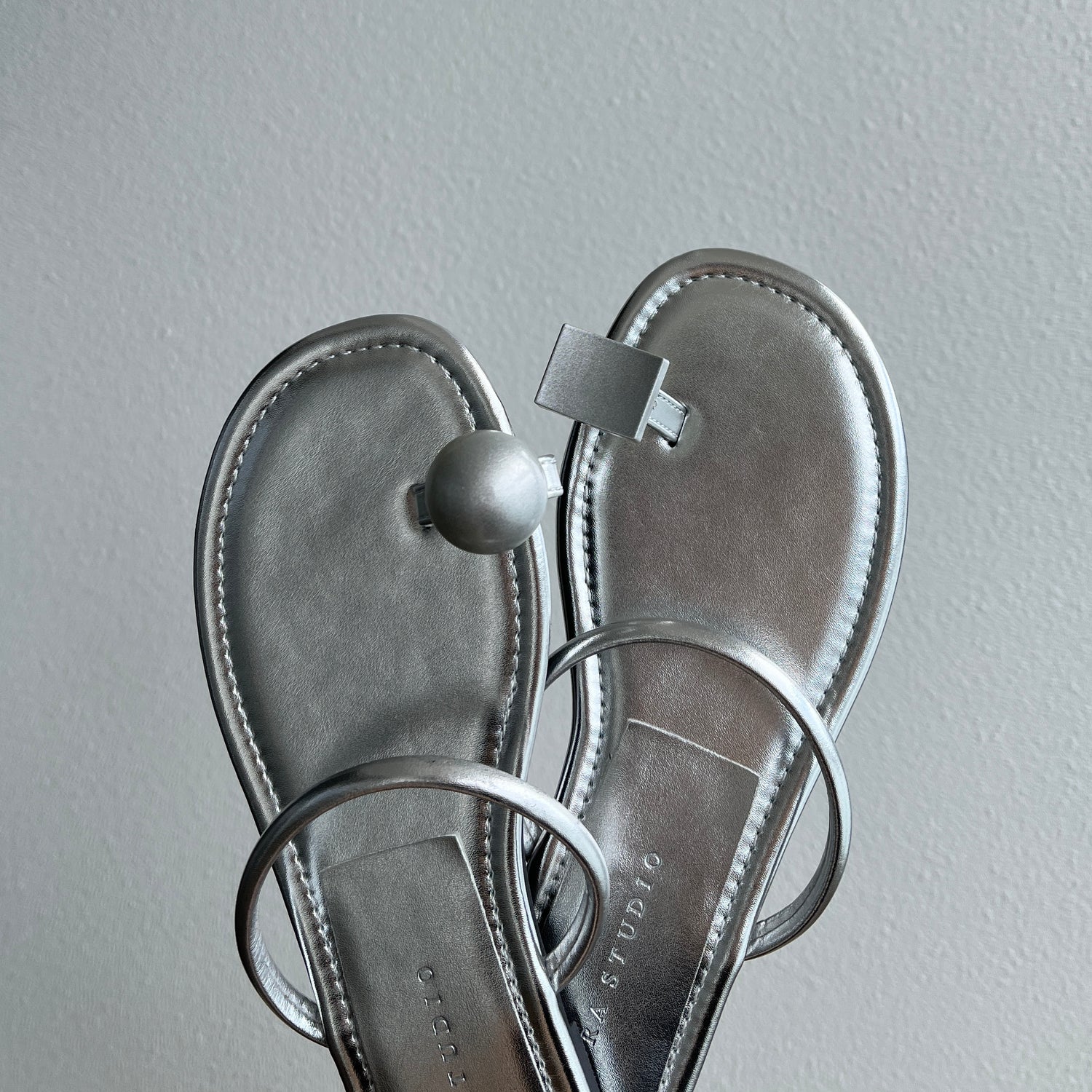 asymmetry flat sandals / silver